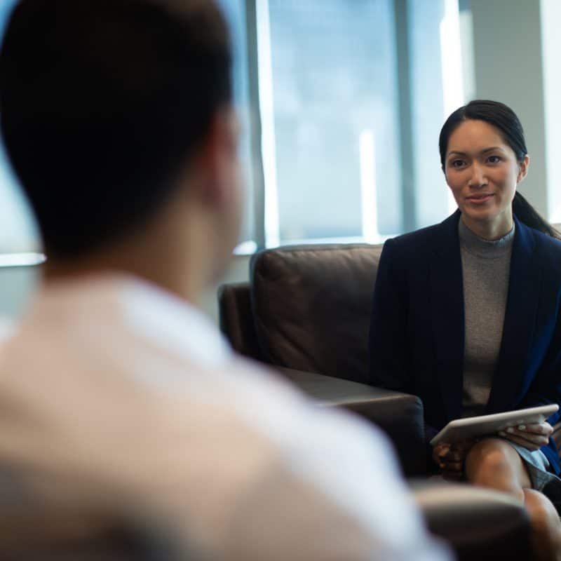 businesswoman discussing with male colleague while 2025 04 03 13 27 05 utc 2