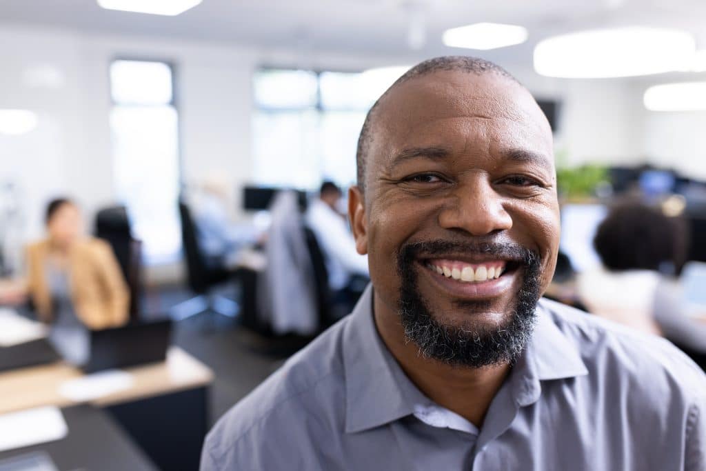 happy african american businessman looking at came 2025 04 04 01 58 42 utc 1