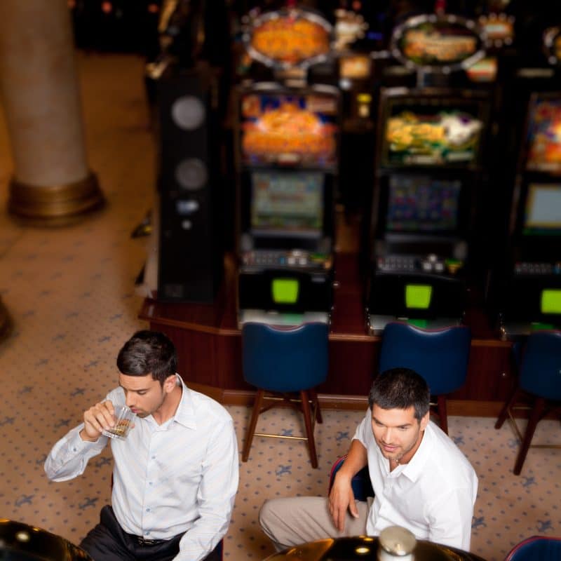 men playing the slot machine 2024 10 15 08 37 34 utc