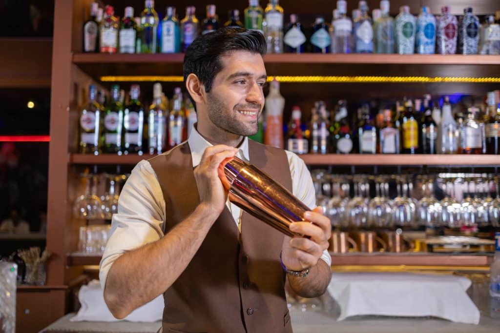 bartender preparing cocktail at upscale bar 2025 03 06 04 45 22 utc